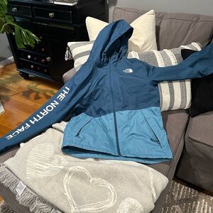 The North Face blue windbreaker/ raincoat